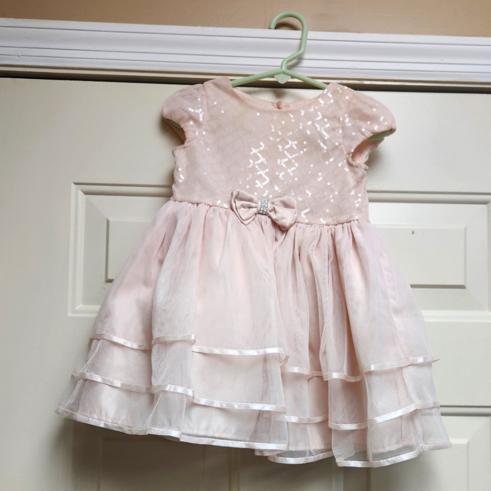 Dress for baby/toddler girl. Light peach color.